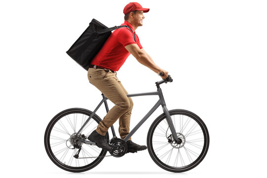 Food delivery guy in a red t-shirt delivering food with a bicycle