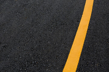 Fototapeta premium asphalt road with yellow lines