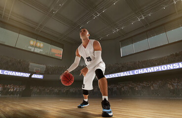 Basketball players on big professional arena during the game.