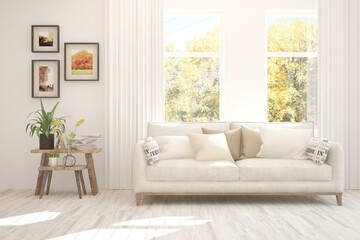 White stylish minimalist room with sofa and autumn landscape in window. Scandinavian interior design. 3D illustration