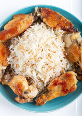 Grilled chicken wings with basmati rice. 