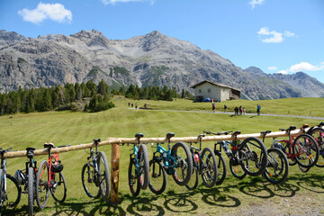 Italy / Bormio – August 14, 2019: Mountain bike rack on the Alps of Lombardy in Italy in a summer...