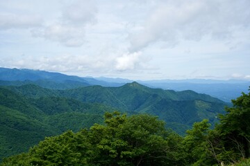 Green mountains landscape with clouds in Yamagata.