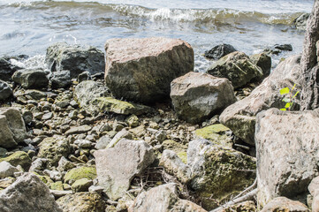 Fototapeta na wymiar water and rocks, water and stones, rocks in the water