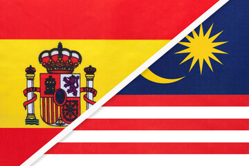 Spain and Malaysia, symbol of two national flags from textile. Partnership between European and Asian countries.