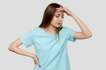 Stressed out woman. Panic attack. Portrait of depressed lady in blue t-shirt suffering from...