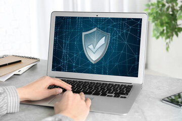 Cyber security concept. Woman using application on laptop, closeup