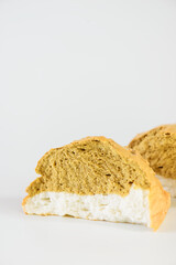 A piece of cloud bread on a white background. Dessert made from sugar and eggs.