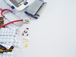 Stethoscope, blood pressure monitor and medicines