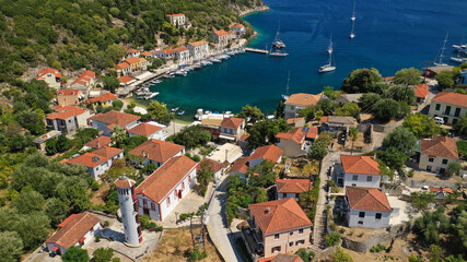 Naklejka na ściany i meble Aerial drone photo of picturesque beautiful seaside village of Kioni a safe anchorage for yachts and sail boats, a true gem of Ithaki or Ithaca island, Ionian, Greece