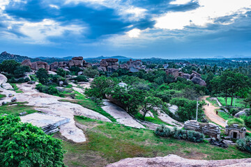 hampi sun set point with dramatic sky at dusk