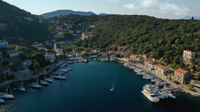 Aerial drone photo of picturesque beautiful seaside village of Kioni a safe anchorage for yachts and sail boats, a true gem of Ithaki or Ithaca island, Ionian, Greece © aerial-drone