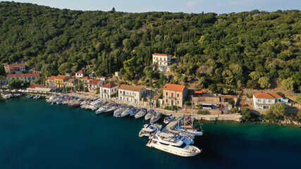 Aerial drone photo of picturesque beautiful seaside village of Kioni a safe anchorage for yachts and sail boats, a true gem of Ithaki or Ithaca island, Ionian, Greece