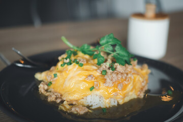 Scrambled eggs minced pork on top hot steam rice