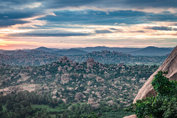 Obraz premium rocky mountain sunrise with dramatic sky at morning flat angle shot