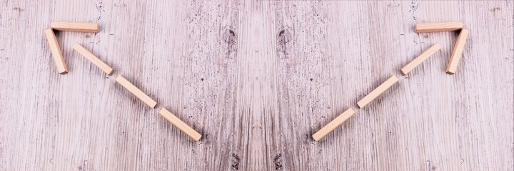 Left and right direction wooden arrow shape on old wood background. Panorama