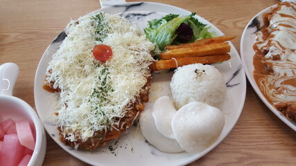 a pork cutlet with cheese