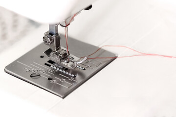 Close up of sewing machine presser foot