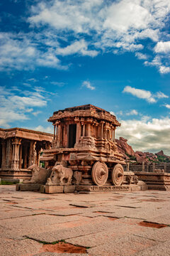 hampi stone chariot the antique stone art piece with amazing blue sky at vithala temple