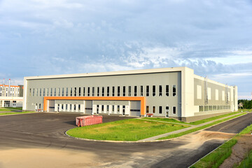 Fototapeta na wymiar Construction of a warehouse for storage of goods and the provision of logistics services