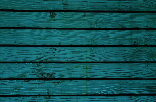 Dark blue colored old wooden plank wall background