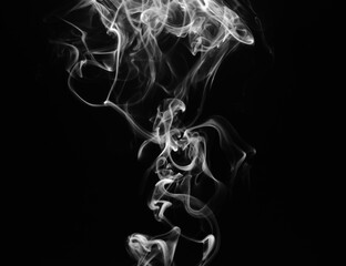 abstract fragment movement of white smoke on black background.