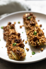 Grilled leek with walnuts and basil 