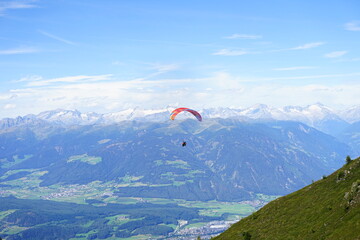 Paraglinder jumping from Plan de Corones, Dolomites, Trentino Alto Adige, Sudtirol, Italy