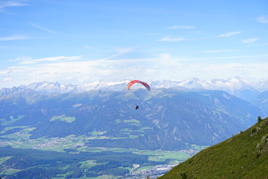 Paraglinder jumping from Plan de Corones, Dolomites, Trentino Alto Adige, Sudtirol, Italy