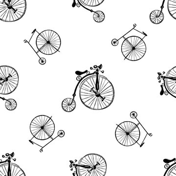 Seamless pattern of hand drawn sketch style penny-farthing bicycles isolated on white background. Vector illustration.