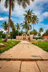 Fototapeta na wymiar narasimha lakshmi temple hampi antique stone art from unique angle with amazing sky