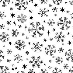 Christmas seamless pattern with doodle snowflakes.