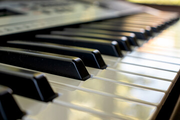 Black and white synthesizer keys music playing piano background of piano keyboard