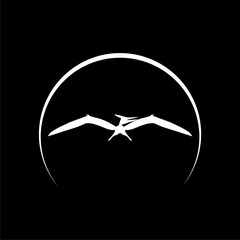 Pteranodon icon isolated on dark background © sljubisa
