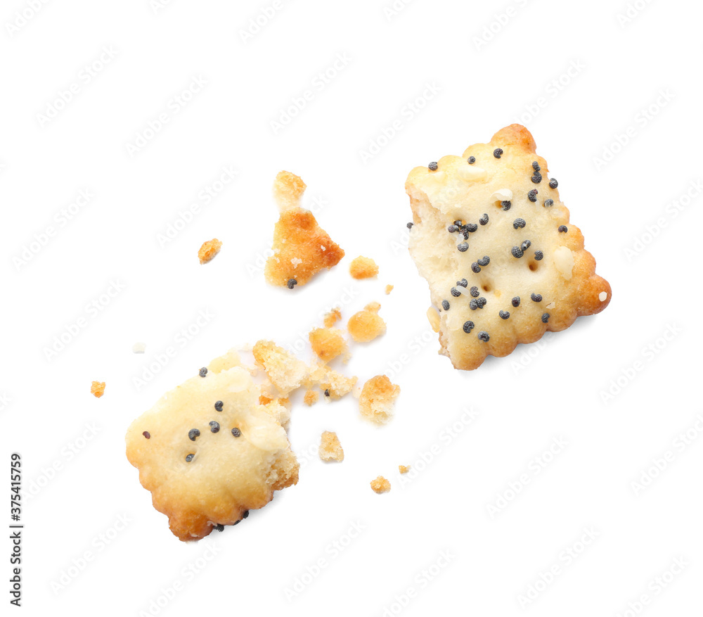 Wall mural broken crispy cracker with poppy and sesame seeds isolated on white, top view