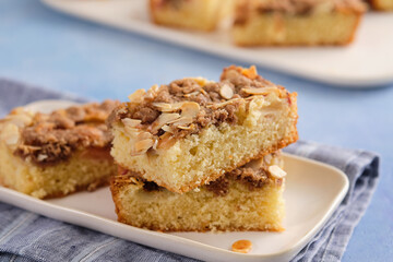Piece of apple pie with almonds. Copy space.