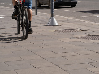man on a Bicycle in an urban environment