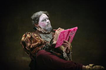 Dear diary. Young man as Johann Bach isolated on dark green background. Retro style, comparison of...