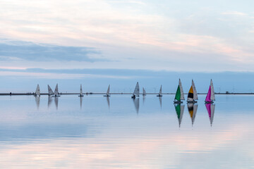 Sailing Dinghies at West Kirby Marine Lake in the evening