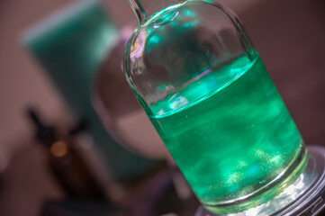 Potion Bottle With Green Glowing Liquid Halloween Spooky Mad Scientist Laboratory Scene