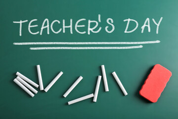 Text Teacher's Day and chalk with duster on greenboard, flat lay. Greeting card design