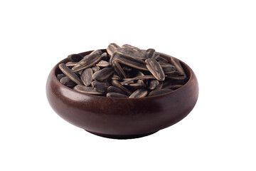 Dry sunflower seeds in a wooden cup on a white background