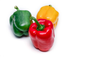 Bell peppers on white background. Red, Yellow and  Green fresh bell pepper