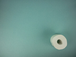 rolls of toilet paper on the table.