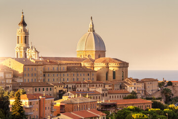 Loreto, Marche, province of Ancona. Panoramic view of the residence of the Basilica della Santa Casa, a popular pilgrimage site for Catholics at sunset.