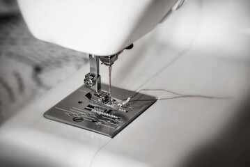 Close up of sewing machine presser foot