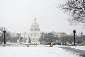 United States Capitol Building in snow - Washington D.C. during wintertime - Washington D.C. United States of America