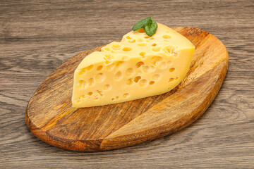 Maasdam cheese - yellow triangle with holes