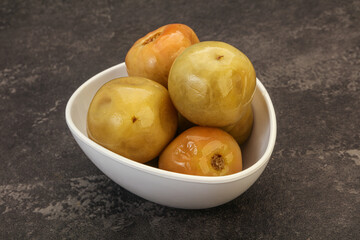 Pickled green tomato in the bowl
