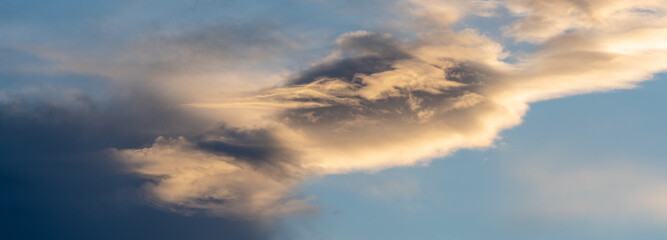 clouds in the sky making shapes, figures and drawings of various colours